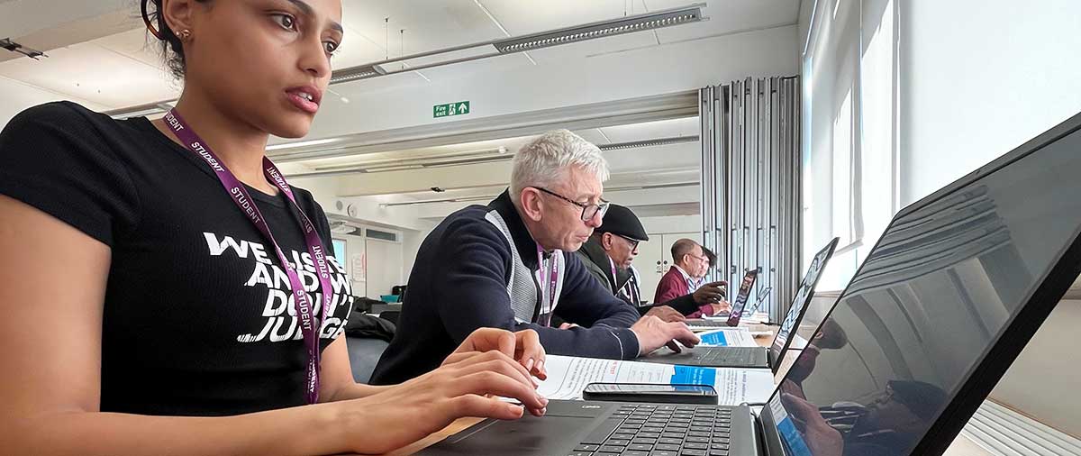 Students in a digital skills course classroom