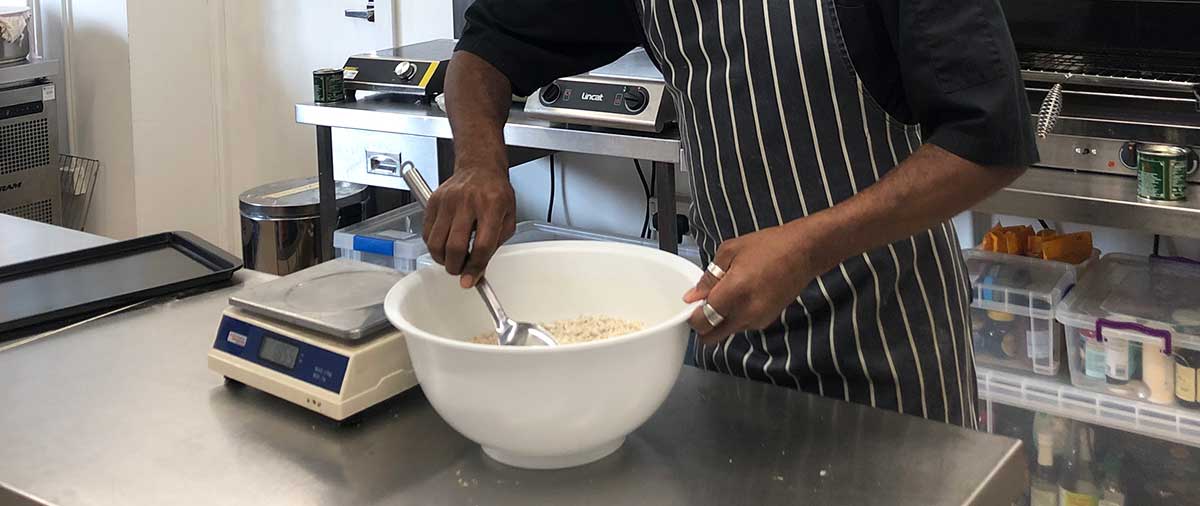 Student learning to cook